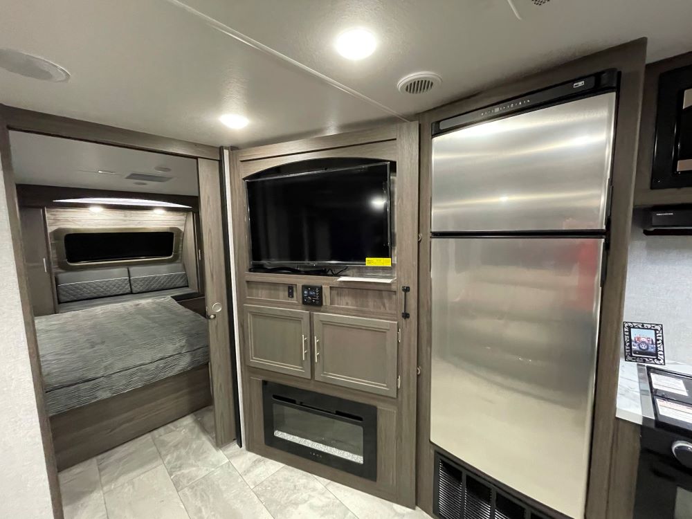 Photo of a hidden pantry in an RV. Camper Design Trends in 2021