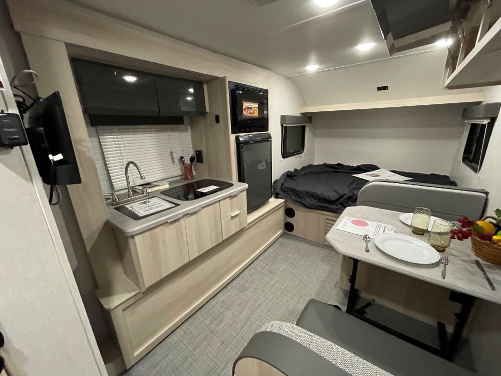 Photo of light wood cabinets in an RV. Camper Design Trends in 2021