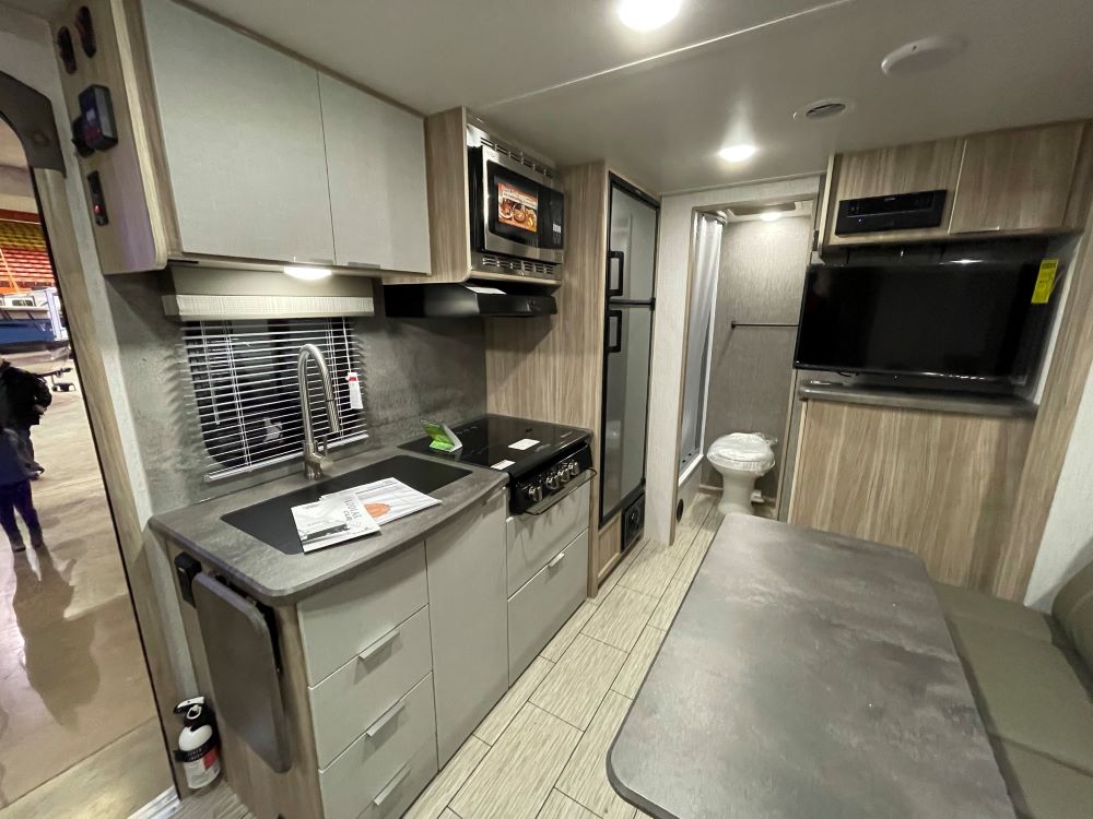 Photo of modern style cabinets in an RV. Camper Design Trends in 2021