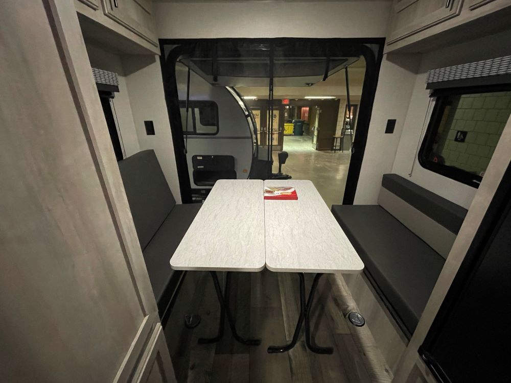 Photo of toy hauler RV with screen room. Camper Design Trends in 2021