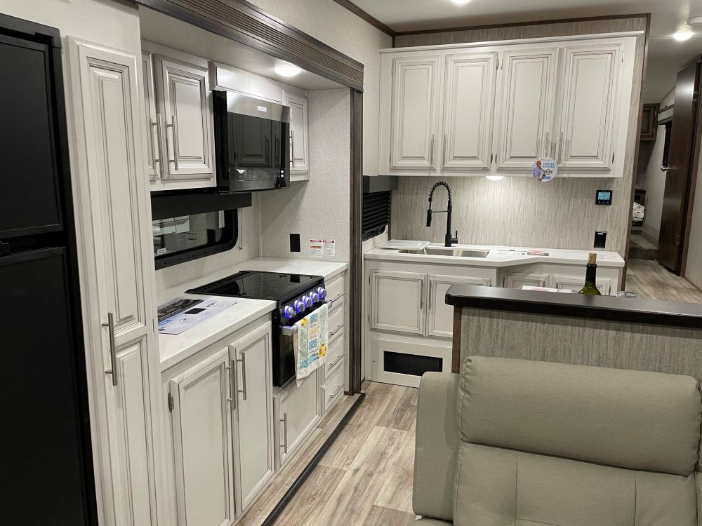 Photo of white cabinets in a new RV. Camper Design Trends in 2021