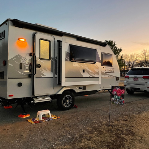 Lance 1475 trailer parked in Stillwater Oklahoma during a sunset