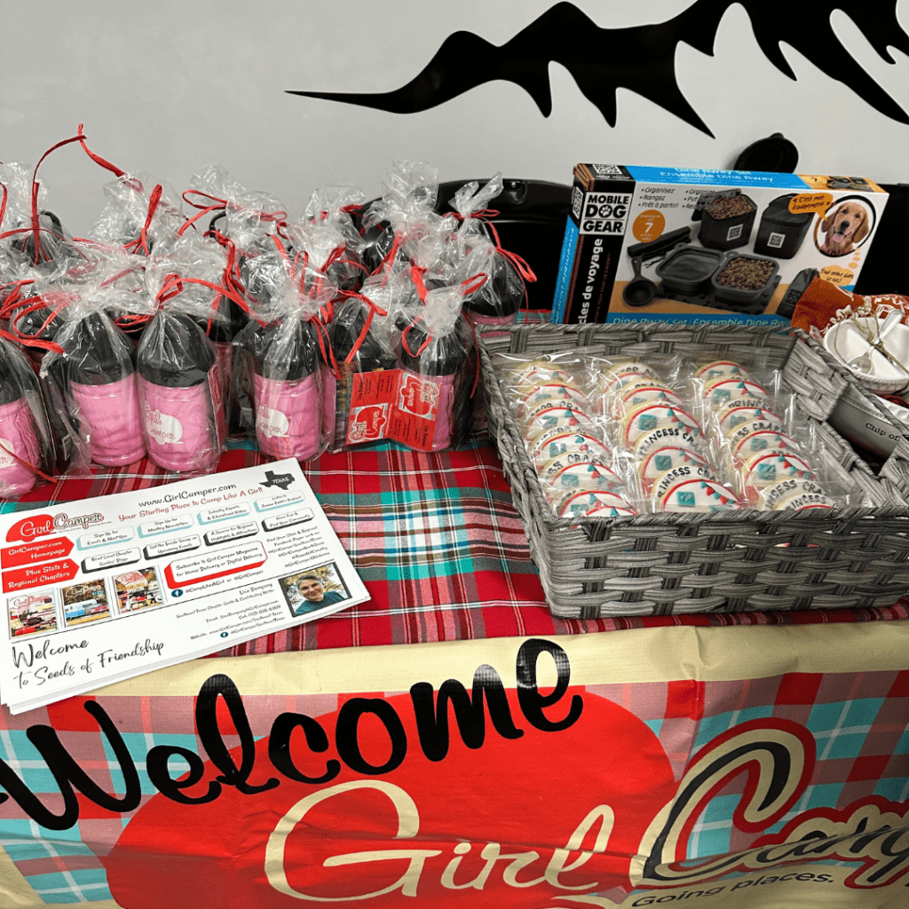 A basket of cookies decorated with small vintage style trailers and Girl Camper Swag from Southeast East Texas Chapter Guide Lisa Dempsey.